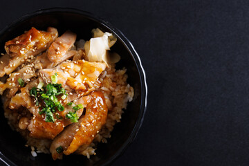 Grilled Chicken teriyaki rice Japanese food isolated in black background
