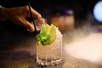 lime cocktail drink in bar