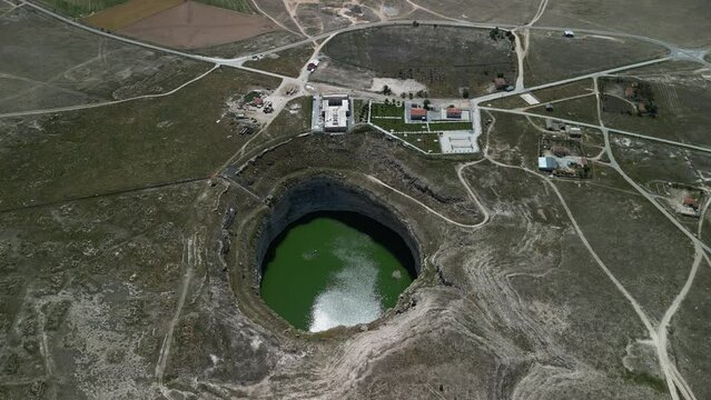 Drone footage of sinkhole formations, deep valleys, natural scenery on Earth. Erosion and the environment. Konya Karapinar district
