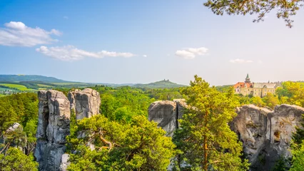 Fotobehang Bohemian Paradise, Czech: Cesky Raj, panorama. View of Hruba Skala Castle, Trosky Castle Ruins and sandstone rocks from Marianska Lookout on sunny summer day, Czech Republic © pyty