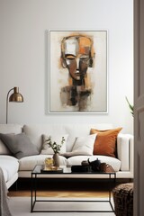 This minimalistic yet vibrant painting on the wall of a white couch, surrounded by a picture frame, cushions, vase, lampshade, and armrest, creates a cozy atmosphere in the den that speaks to a timel