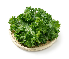 Kale in a colander set against a white background.