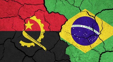 Flags of Angola and Brazil on cracked surface - politics, relationship concept - obrazy, fototapety, plakaty