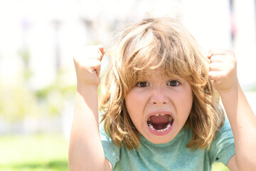 Kid boy temper with angry expression. Angry hateful little anger boy, child furious. Angry rage...