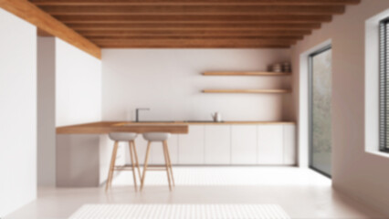 Blurred background, minimal wooden kitchen. Resin floor and wooden ceiling. Cabinets, island with stools and appliances. Japandi interior design