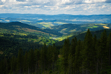 The treetop walk Bachledka in Bachledova valley in Slovakia. Bachledka Ski  Sun within the town of Zdiar. The Bachledzka Valley descends into the Zdziarska Valley opposite the Belianske Tatras.