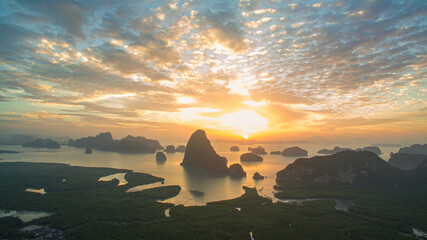 .aerial view Amazing light of nature cloudscape sky above Samed Nang Chee Phang Nga archipelago....