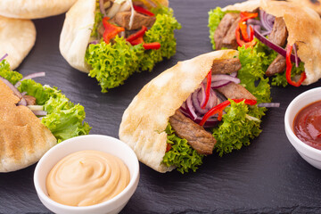 Pita stuffed with chicken
