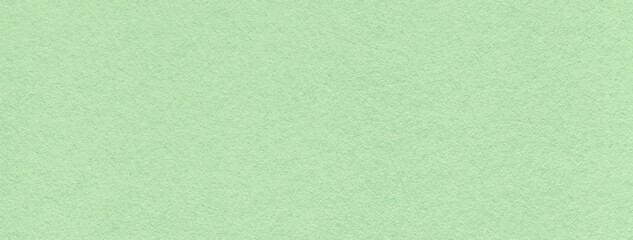 Texture of craft light green and mint paper background colors, macro. Structure of vintage kraft...
