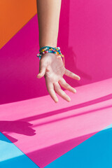 Open hand with jewelry bracelet accessories in beauty and fashion barbie style - 630643076