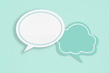 For conceptual image about communication and social media, customer feedback, Blank correspondence white and green grunge  paper speech bubbles on rough light green paper texture