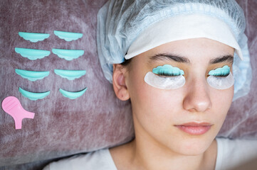 Portrait of a woman in a beauty salon on the procedure of eyelash lamination. 