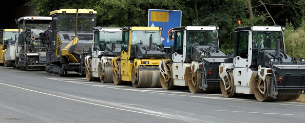 Road construction machinery on the highway - 630646629