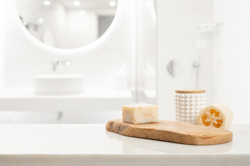 Natural wooden soap stand for bathing products in blurred bathroom