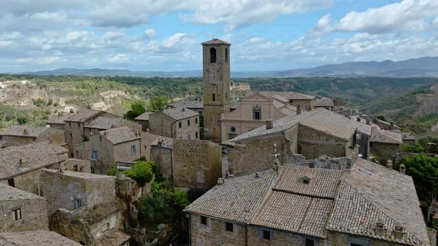Aerial over the hilltop village of Civita di Bagnoregio, Province of Viterbo, Italy. Drone orbit shot
