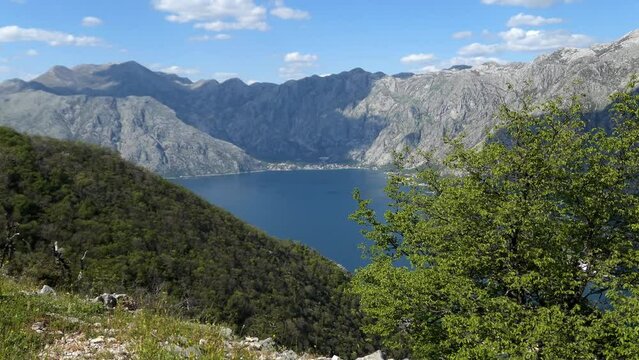Beautiful mountain range by the sea, establishing shot, Kotor Bay, Montenegro