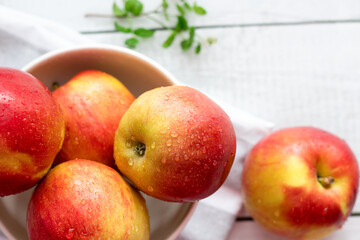 honey with apples and honey. on a white table