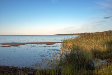 Fototapeta na wymiar sunset on the beach,bergafjärden, medelpad, sverige,sweden, norrland, Mats