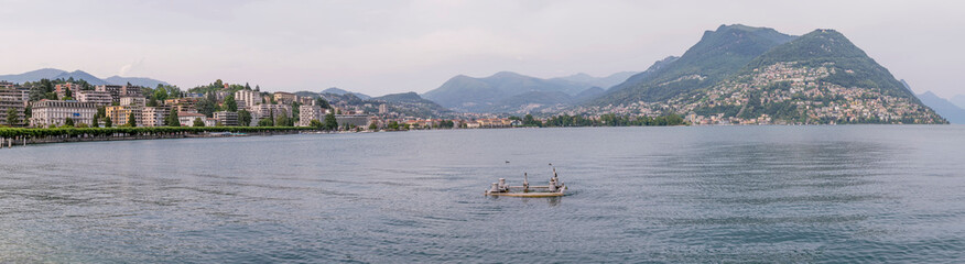 Fototapeta na wymiar Panoramic view of Lugano, Switzerland, from Riva Antonio Caccia to Monte Brè