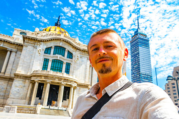 Man with selfie at fine arts architectural masterpiece Mexico City. - obrazy, fototapety, plakaty