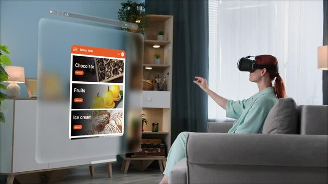 shopping for groceries with help of modern technologies, young woman in VR glasses browses store website for ordering and buying food home using modern technologies