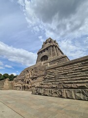 Fototapeta premium Monument to the Battle of the Nations and a cloudy sky 