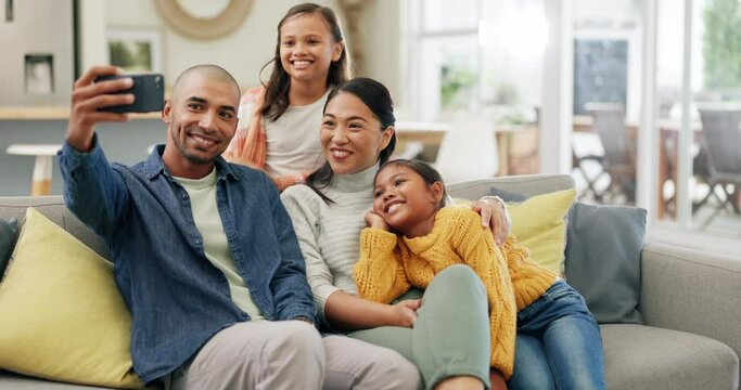 Selfie, smile and parents with children on sofa in living room of home, bonding and quality time together. Digital photography, happy family and mother, father and kids on couch for picture of memory