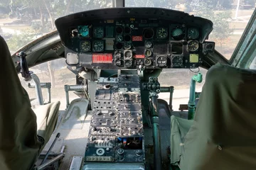 Deurstickers cockpit of a military helicopter © Rehan