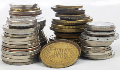 Silver and gold coins from different countries and tomes - macro, coin towers