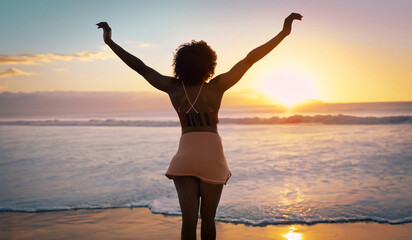 Sunset Bliss: Woman Embracing the Beach with Arms Raised - High-Resolution Stock Photo 