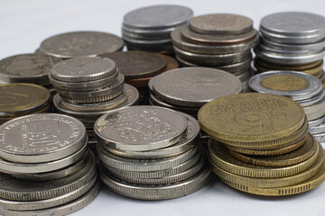 Silver and gold coins from different countries and tomes - macro