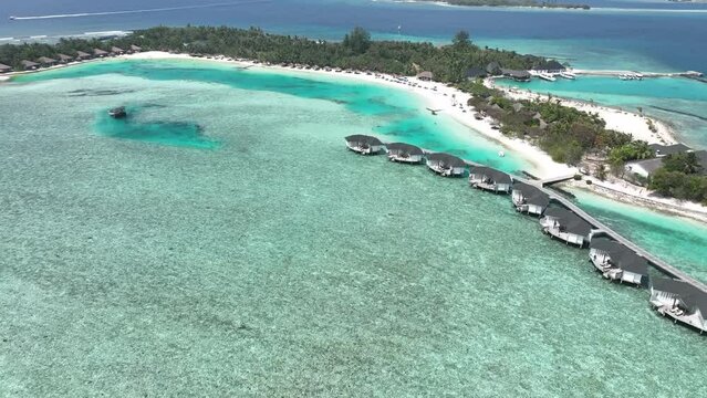 aerial view, Asia, Maldives, North Male Atoll, Kuda Huraa,  Four Season Maldives, , with beaches and water bungalows
