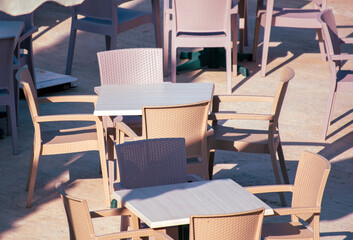 Plastic chairs and tables in a restaurant.
