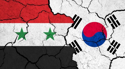 Flags of Syria and South Korea on cracked surface - politics, relationship concept