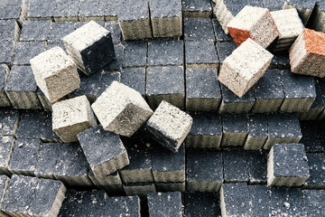 Paving slabs building material stack. Pavement stone for road works