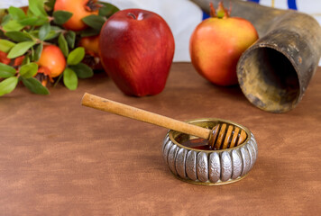 One of iconic symbols Rosh Hashanah is dipping apples in honey, symbolizing hopes for sweet...