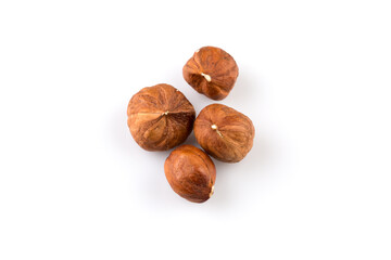 Hazelnuts on the white background