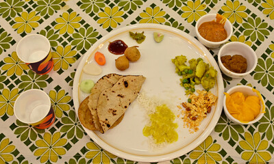 indian wedding food plate. vegetarian food. marathi traditional food. maharashtra food