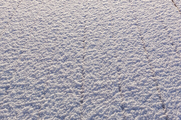 Snow covered wood terrace floor