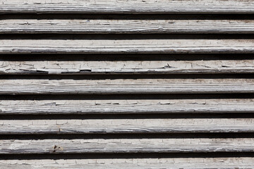 wooden shutters, covering a window or door