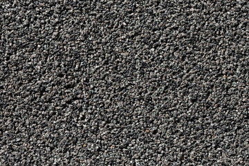 Crushed granite stones wall - close up