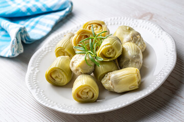 Pickled Artichoke Hearts with Marinated in Plate.
