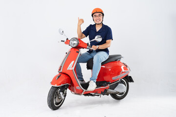 Fototapeta na wymiar full body photo of a man wearing a hairdresser and driving a motorbike