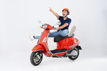 Fototapeta na wymiar full body photo of a man wearing a hairdresser and driving a motorbike