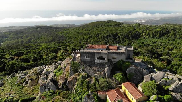 The Santuario da Peninha and Palace - Sintra, Portugal near Lisboa. Aerial drone view. Flying over. High quality 4k footage 