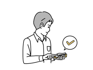 スマートフォンをチェックする若い男性