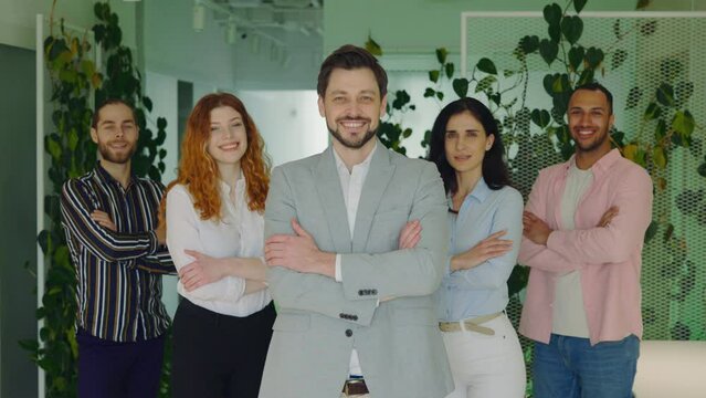 Happy Multiethnic Business People with Professional Team Leader Businessman tanding in Office