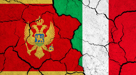 Flags of Montenegro and Italy on cracked surface - politics, relationship concept - obrazy, fototapety, plakaty