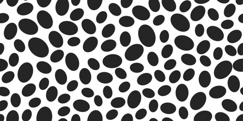 Black ovals, spotted simple and vector pattern. Monochrome pattern of simple spots. Seamless pattern for textiles, pillows, clothes, background, packaging, notepads. Vector.