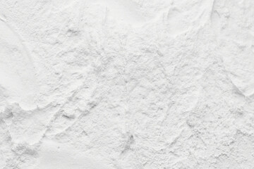 Obraz premium Decorative white putty background. Wall texture with filler paste applied with spatula, chaotic dashes and strokes over plaster.
